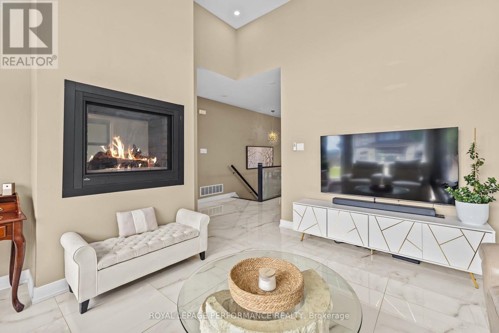 301 Dore Street, Casselman, ON - Indoor Photo Showing Living Room With Fireplace