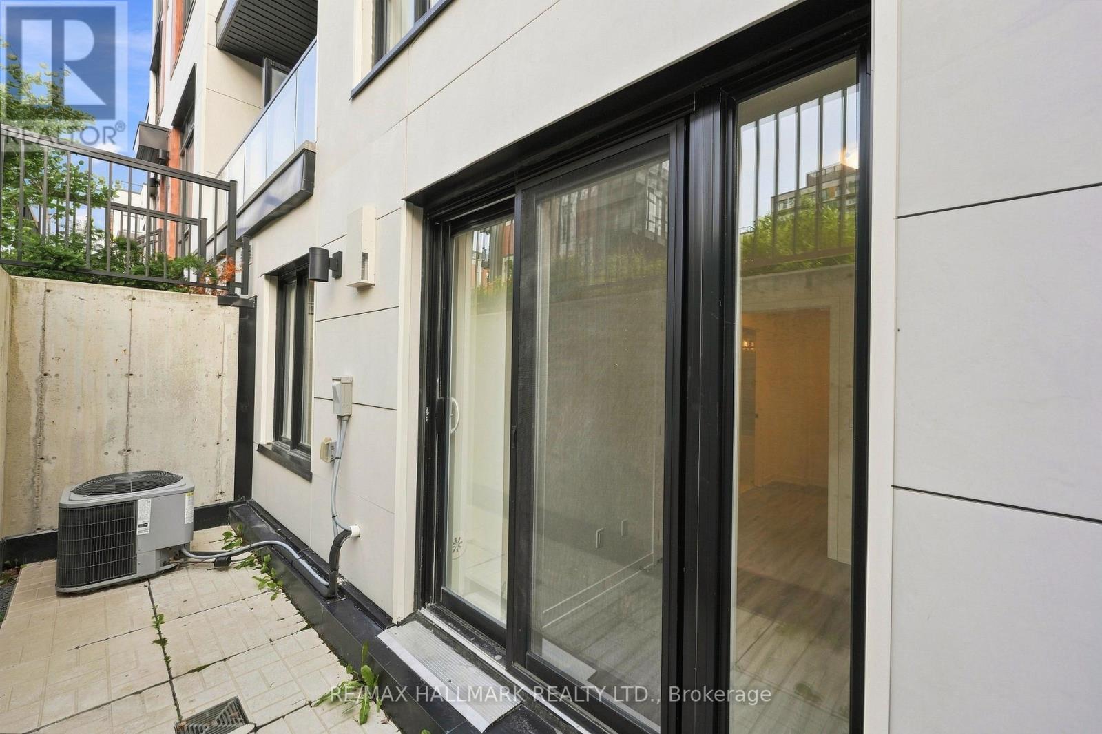 Downstairs Patio Entrance - 1508 - 11 David Eyer Road, Richmond Hill, ON - With Exterior