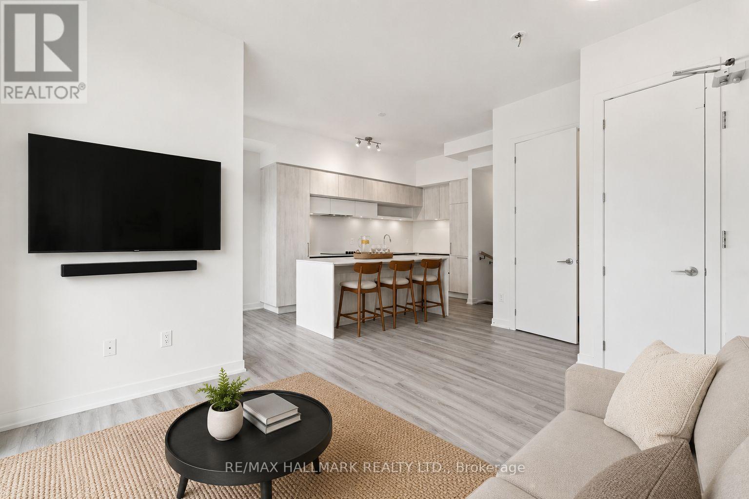 Living Area with Kitchen Access - 1508 - 11 David Eyer Road, Richmond Hill, ON - Indoor Photo Showing Living Room