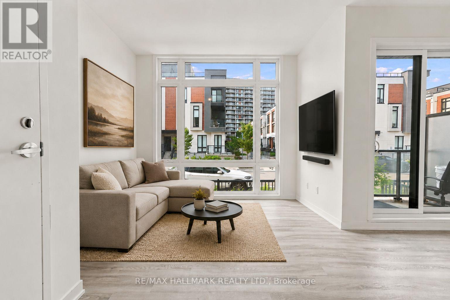 Living Area with Floor to Ceiling Windows - 1508 - 11 David Eyer Road, Richmond Hill, ON - Indoor Photo Showing Living Room