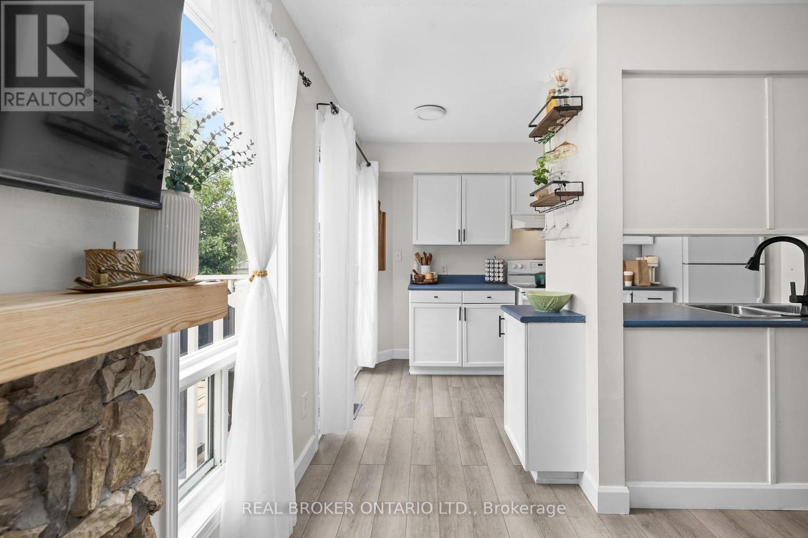 149 Crampton Drive, Carleton Place, ON - Indoor Photo Showing Kitchen With Fireplace