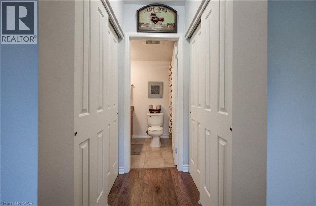 Double closets, leading to the ensuite bathroom. - 8 Harris Street Unit# 118, Cambridge, ON - Indoor Photo Showing Other Room