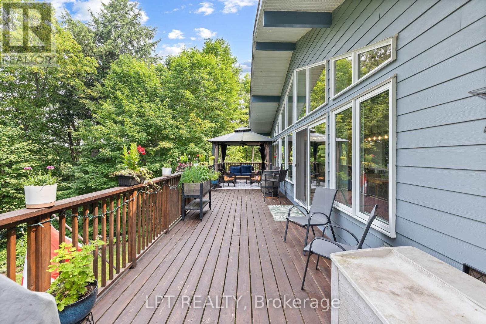 Wrap-Around Deck - 500A Hazard Hill Road, Kearney, ON - Outdoor With Deck Patio Veranda With Exterior