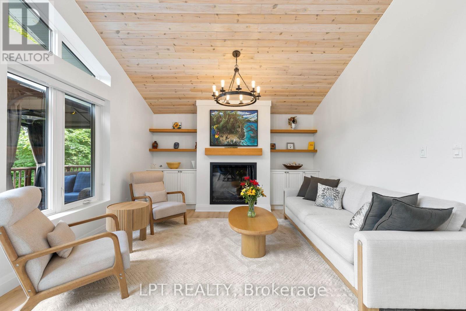 500A Hazard Hill Road, Kearney, ON - Indoor Photo Showing Living Room With Fireplace