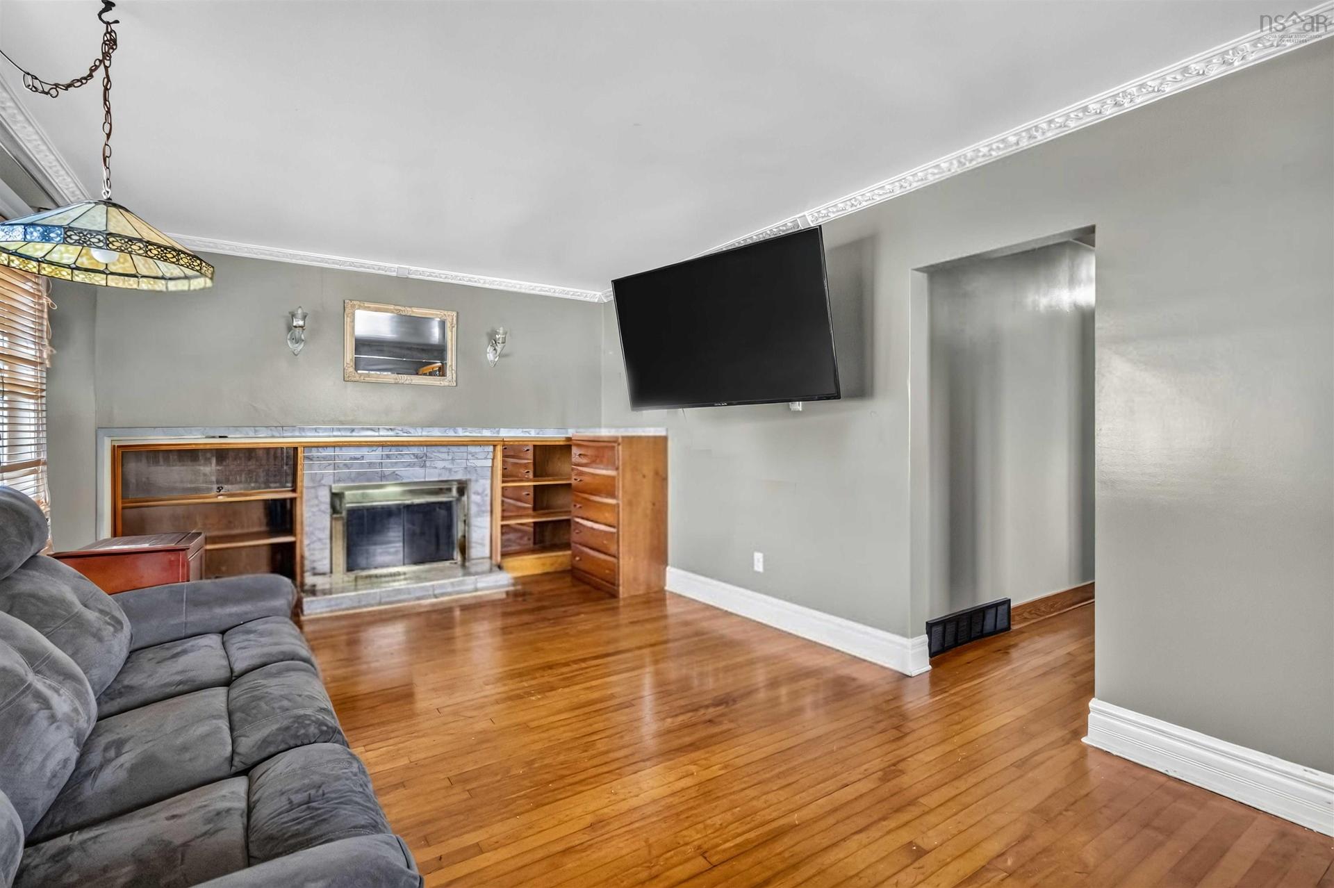 12 Auburn Avenue, Spryfield, NS - Indoor Photo Showing Living Room With Fireplace