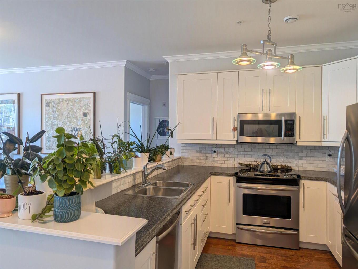 204 24 Harbourside Drive, Wolfville, NS - Indoor Photo Showing Kitchen With Double Sink