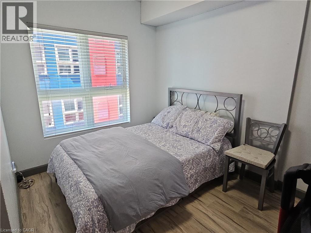 Bedroom featuring wood finished floors - 258B Sunview Street Unit# 255, Waterloo, ON - Indoor Photo Showing Bedroom