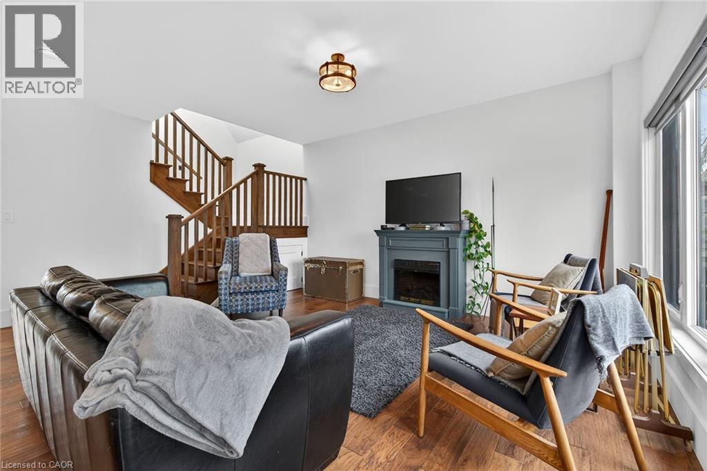 1300 River Road, Cayuga, ON - Indoor Photo Showing Living Room With Fireplace
