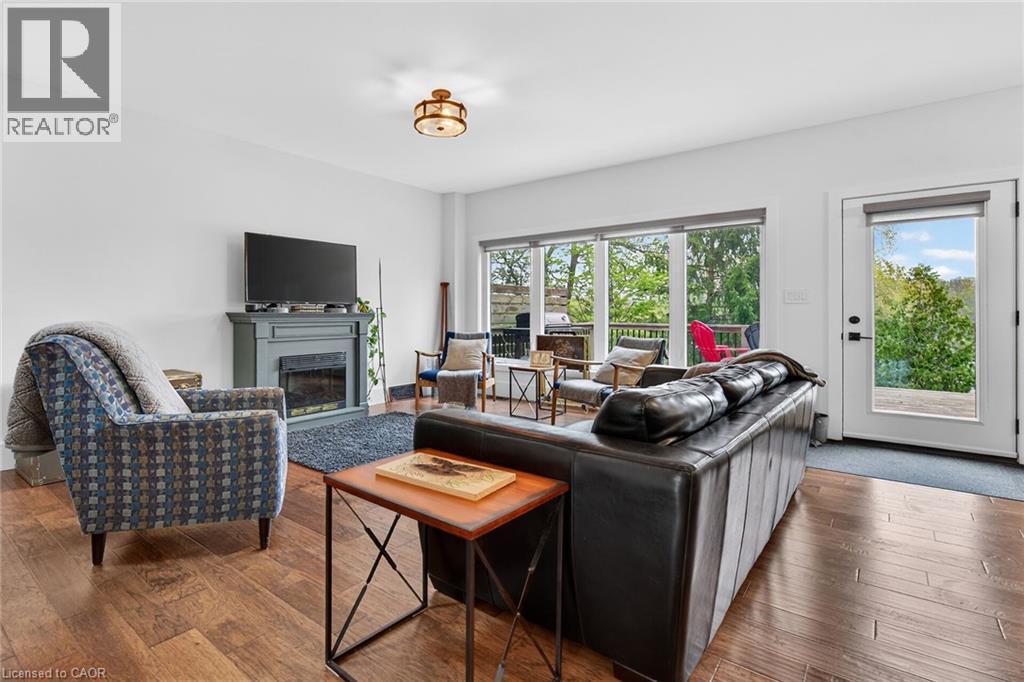 1300 River Road, Cayuga, ON - Indoor Photo Showing Living Room With Fireplace