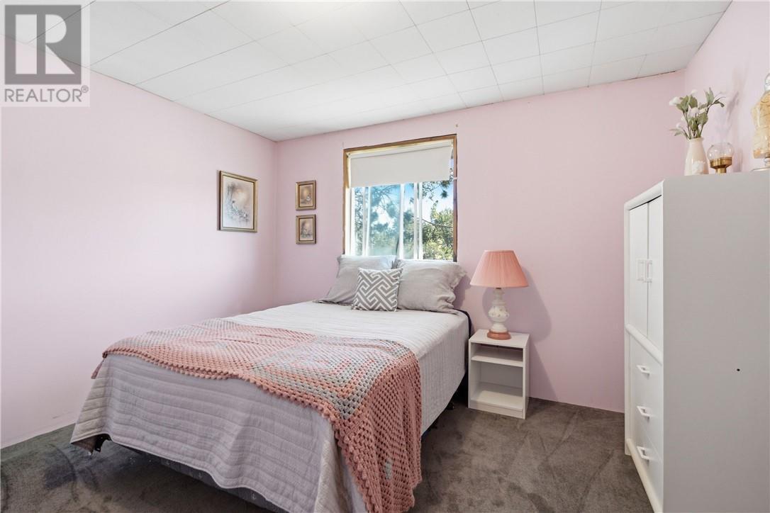 25 Savard Road, Wahnapitae, ON - Indoor Photo Showing Bedroom