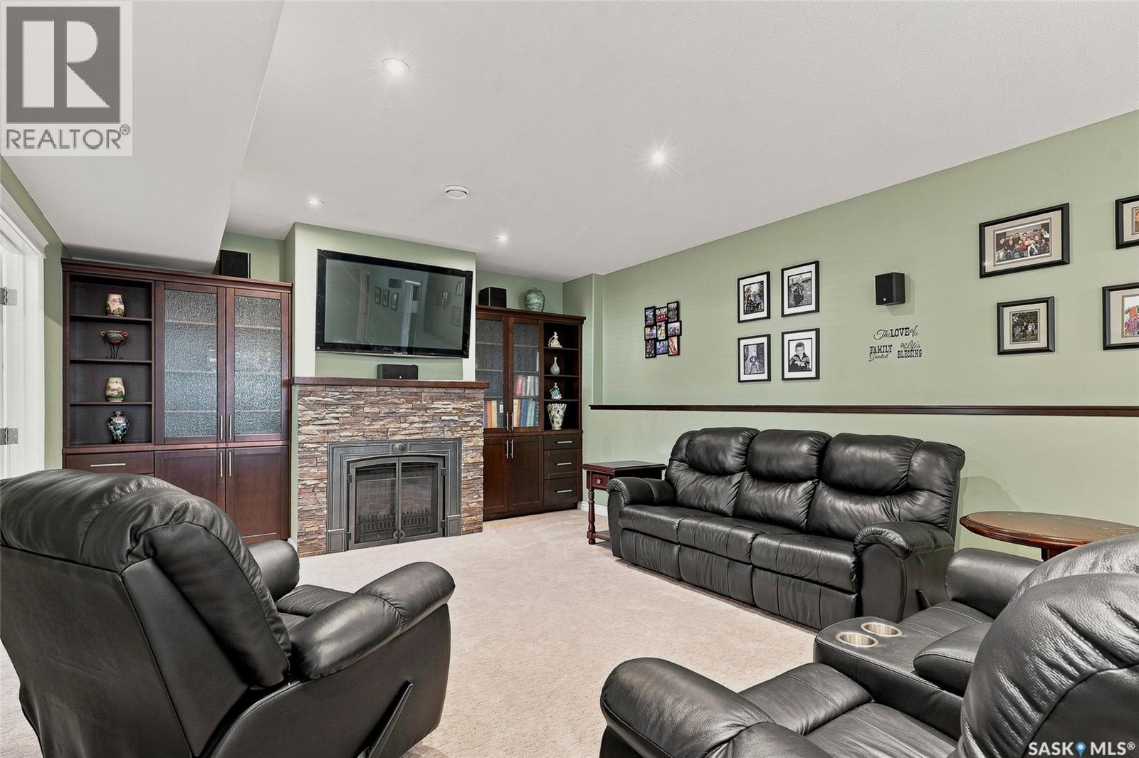 415 Paton Place, Saskatoon, SK - Indoor Photo Showing Living Room With Fireplace
