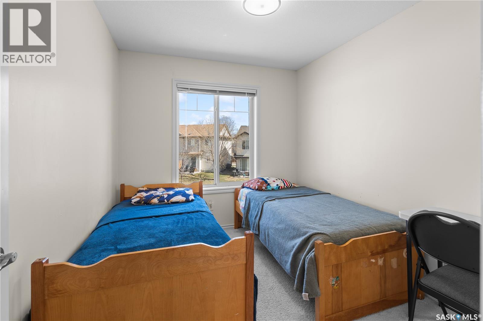 420 303 Slimmon Place, Saskatoon, SK - Indoor Photo Showing Bedroom