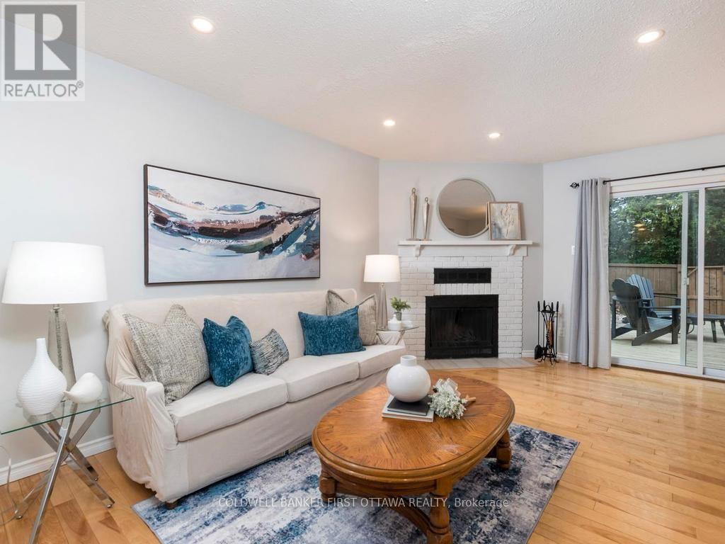 75 Sundback Lane, Ottawa, ON - Indoor Photo Showing Living Room With Fireplace