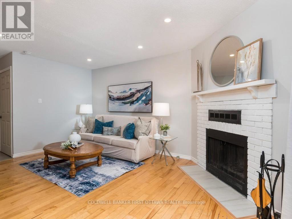 75 Sundback Lane, Ottawa, ON - Indoor Photo Showing Living Room With Fireplace