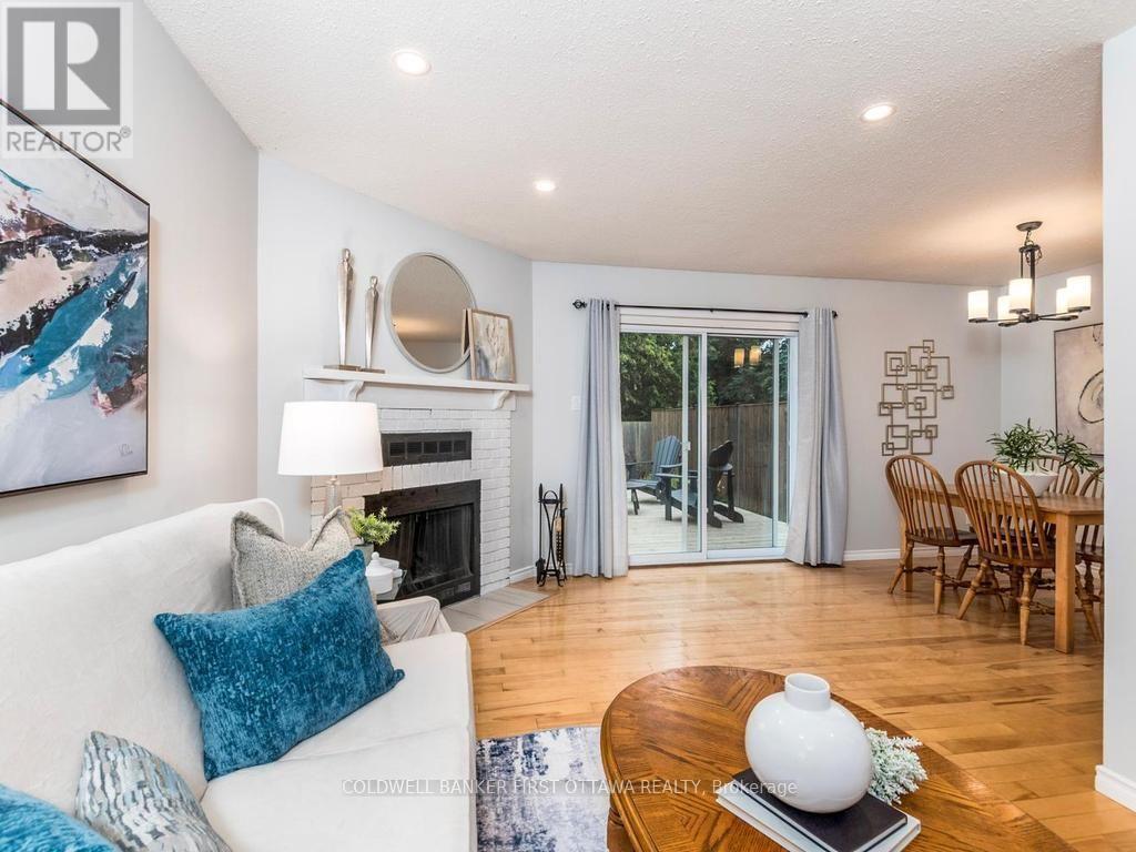 75 Sundback Lane, Ottawa, ON - Indoor Photo Showing Living Room With Fireplace