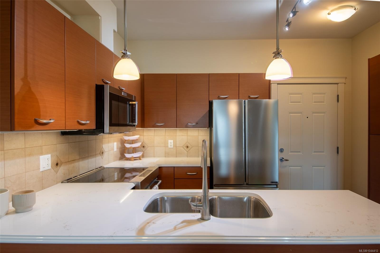 #202-2380 Brethour Ave, Sidney, BC - Indoor Photo Showing Kitchen With Double Sink