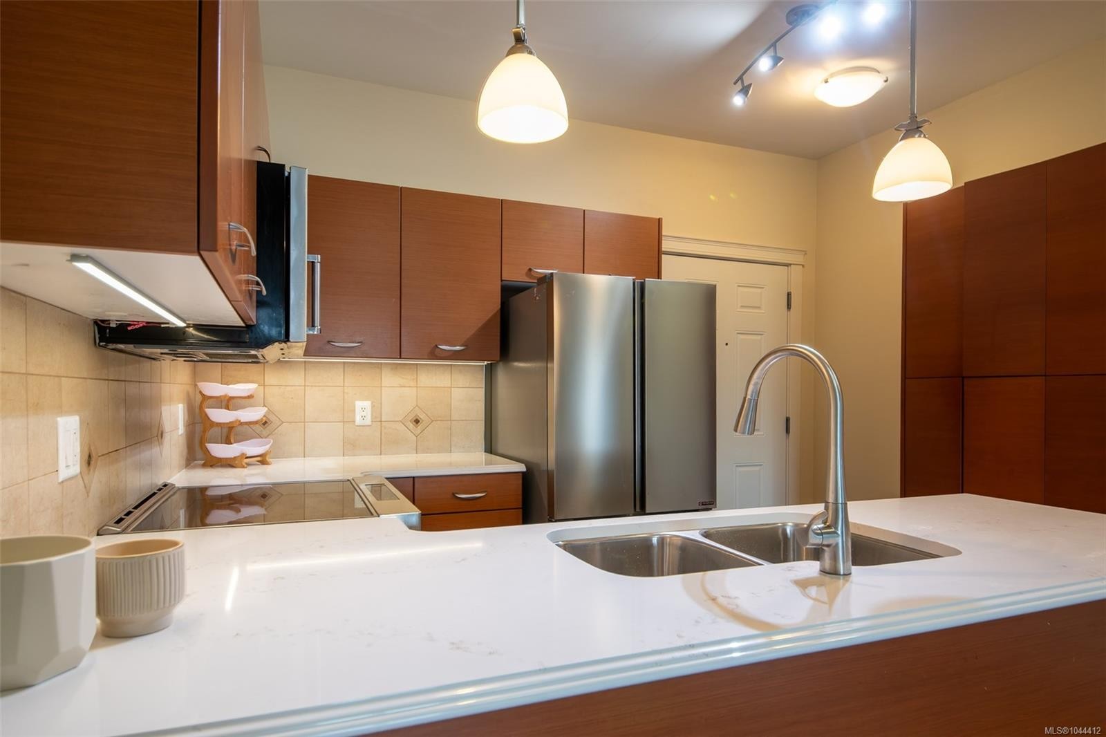 #202-2380 Brethour Ave, Sidney, BC - Indoor Photo Showing Kitchen With Double Sink