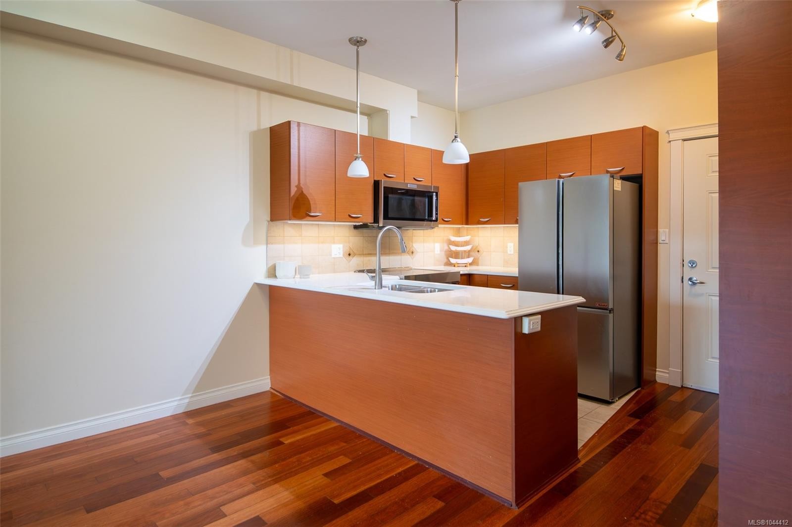 #202-2380 Brethour Ave, Sidney, BC - Indoor Photo Showing Kitchen With Double Sink