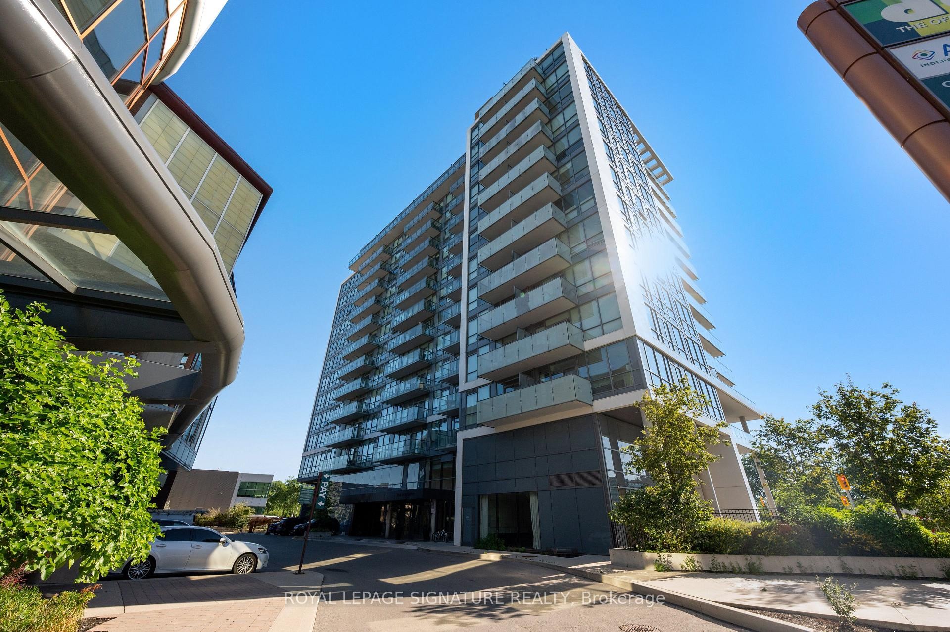 710-10 De Boers Drive E, Toronto, ON - Outdoor With Facade