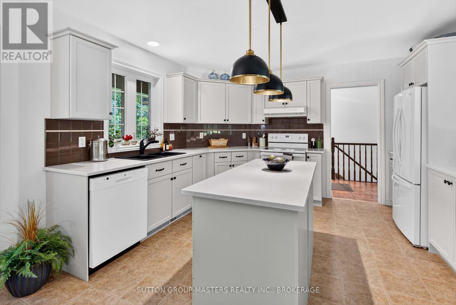 710 Maple Road, Loyalist (Lennox And Addington - South), ON - Indoor Photo Showing Kitchen With Double Sink