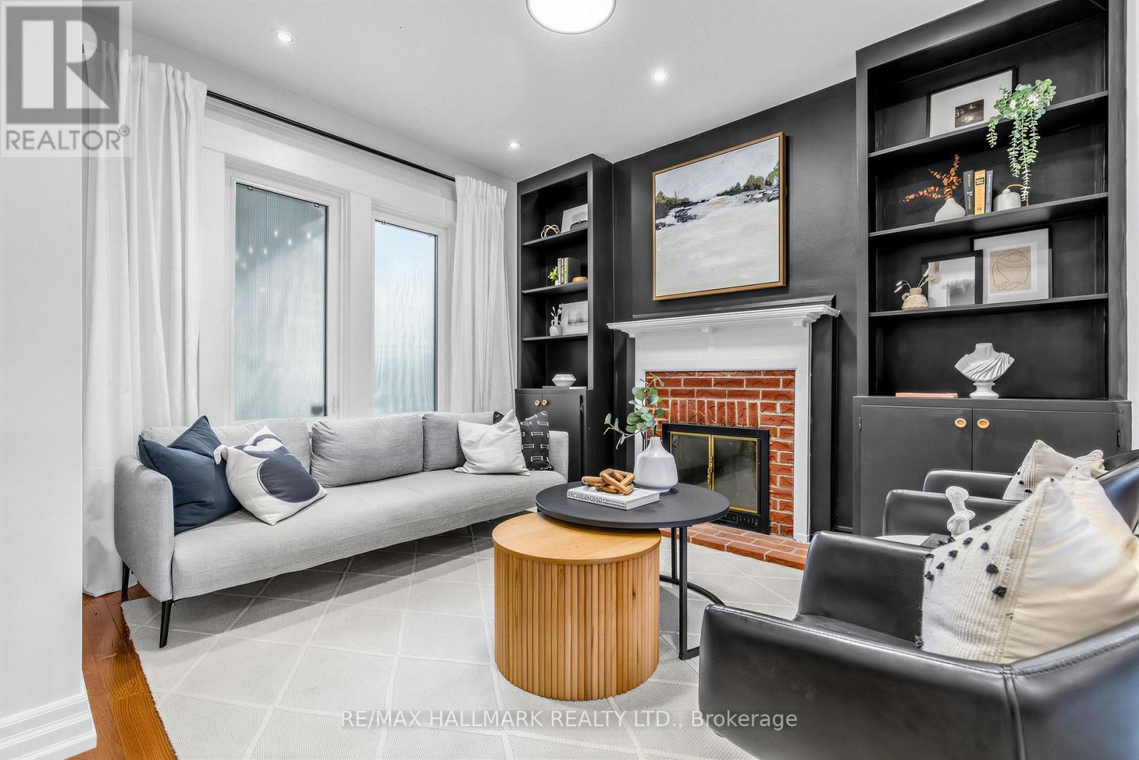 255 Strathmore Boulevard, Toronto, ON - Indoor Photo Showing Living Room With Fireplace