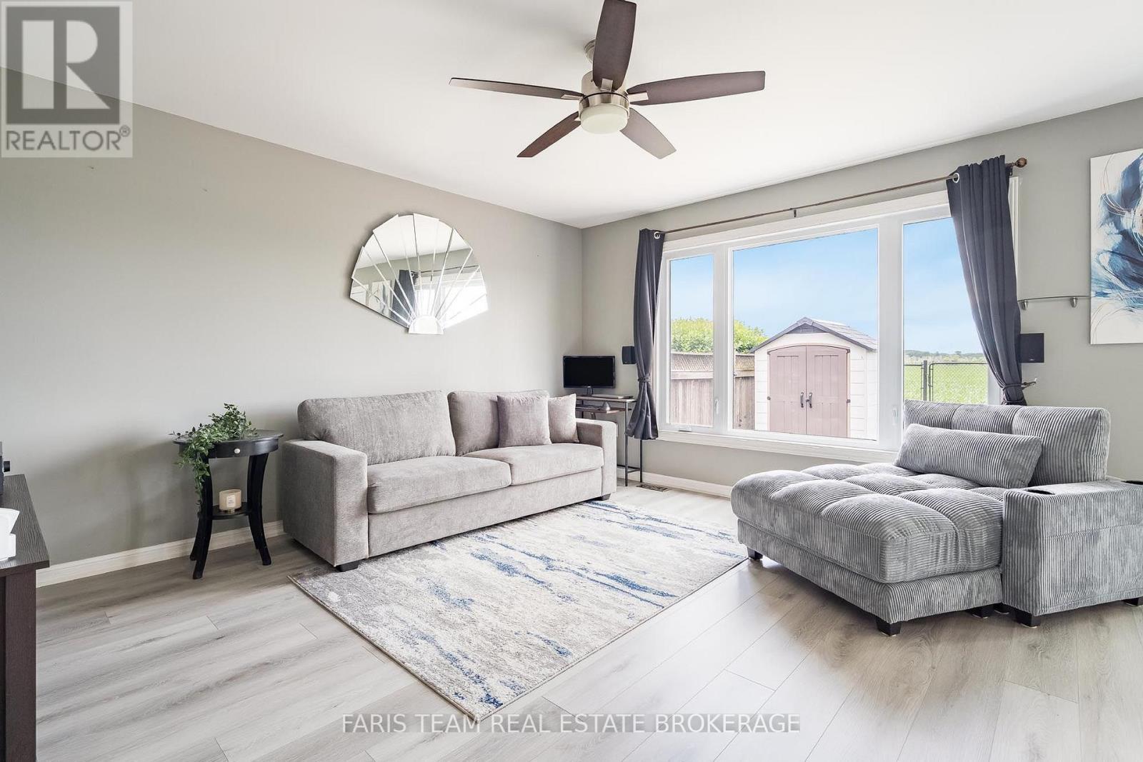 64 John W Taylor Avenue, New Tecumseth, ON - Indoor Photo Showing Living Room