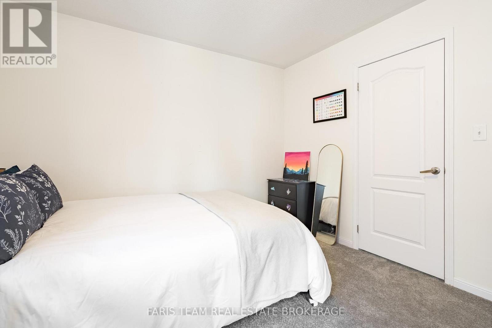 64 John W Taylor Avenue, New Tecumseth, ON - Indoor Photo Showing Bedroom