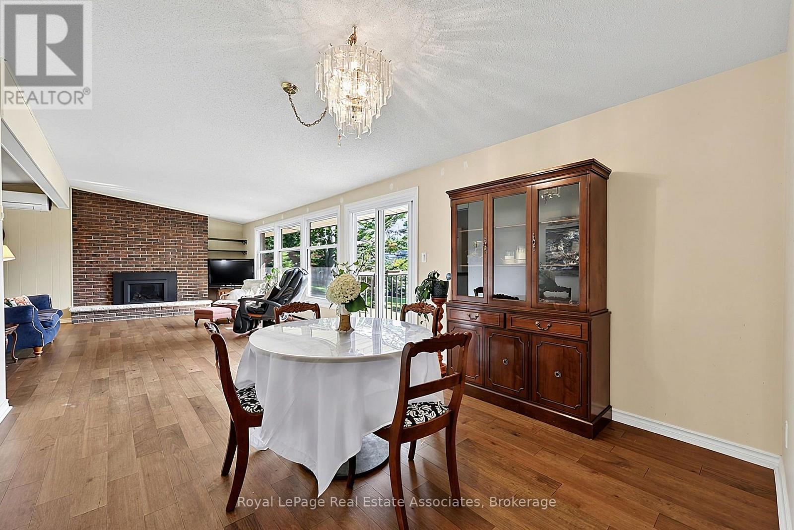 408 Mooney Crescent, Orillia, ON - Indoor Photo Showing Dining Room With Fireplace