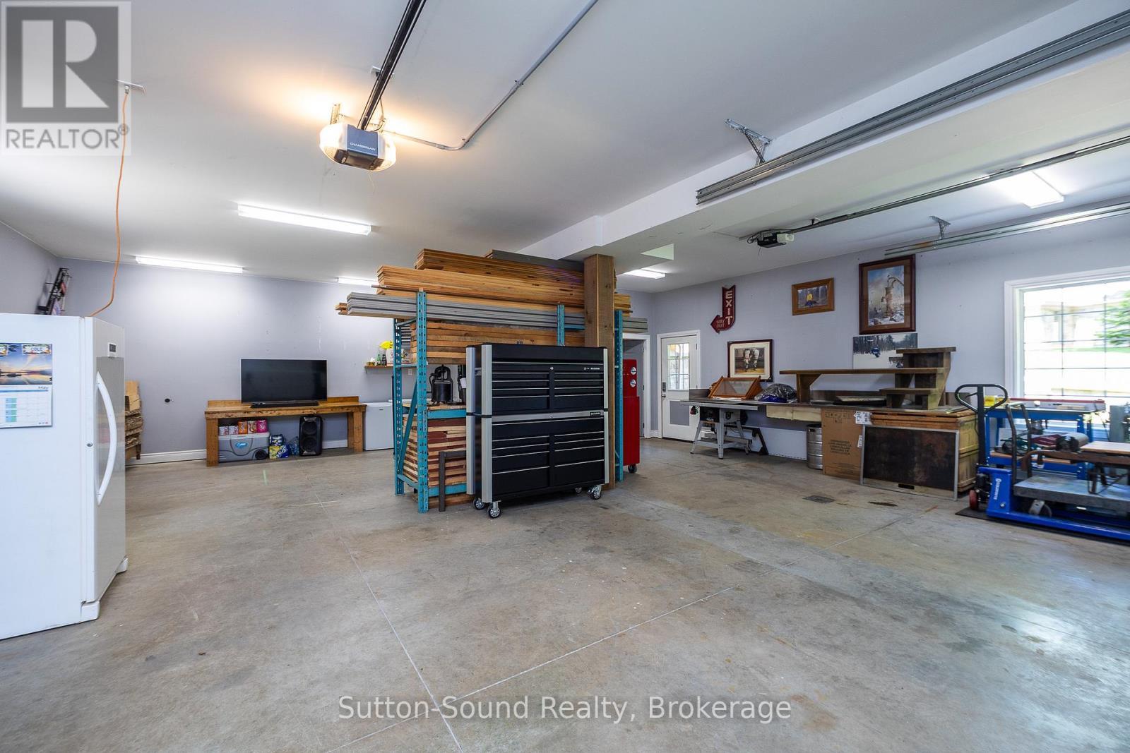 Secondary Garage - 505556 Grey Road 1 Road, Georgian Bluffs, ON - Indoor Photo Showing Garage