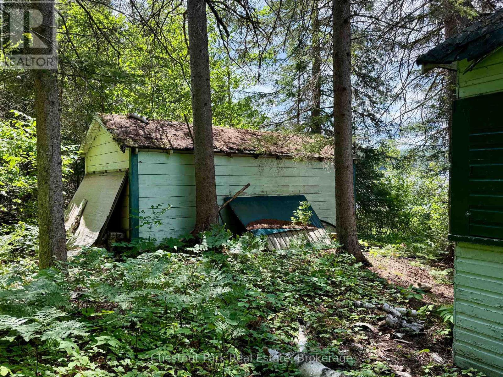 Good sized dryland boathouse for storage/convert - 17 Whitefish Lake Apl1582, Algonquin Highlands (Lawrence), ON - Outdoor With Body Of Water