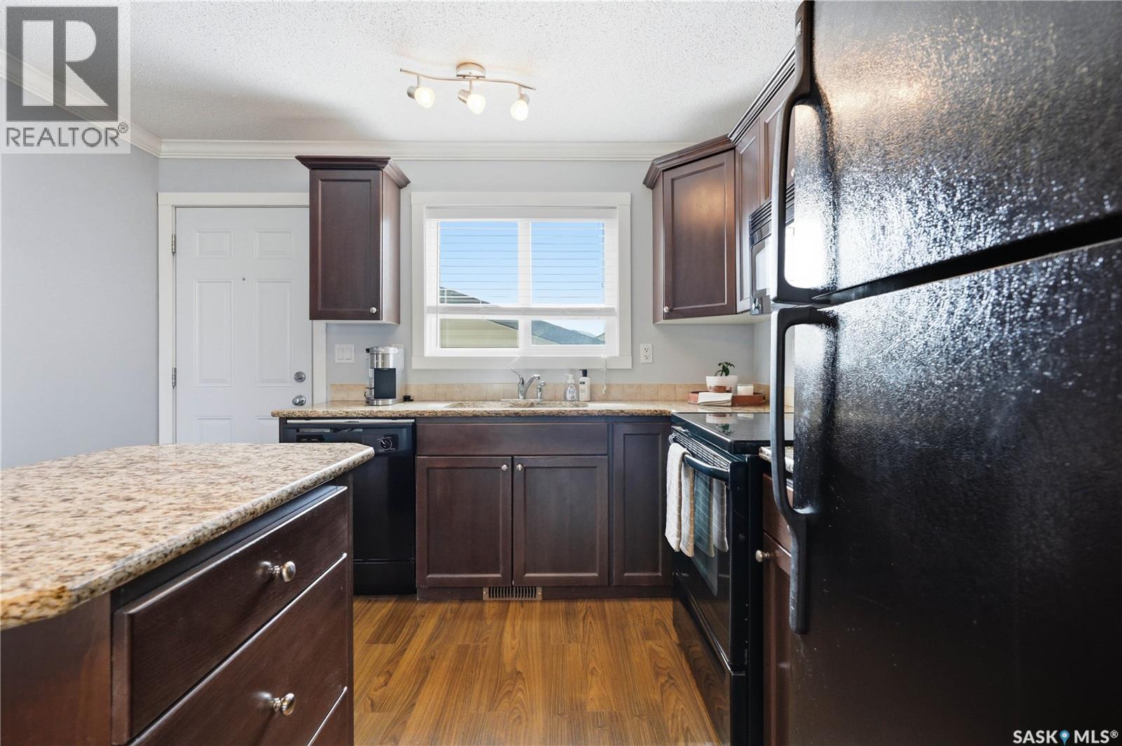 317 315 Hampton Circle, Saskatoon, SK - Indoor Photo Showing Kitchen With Double Sink