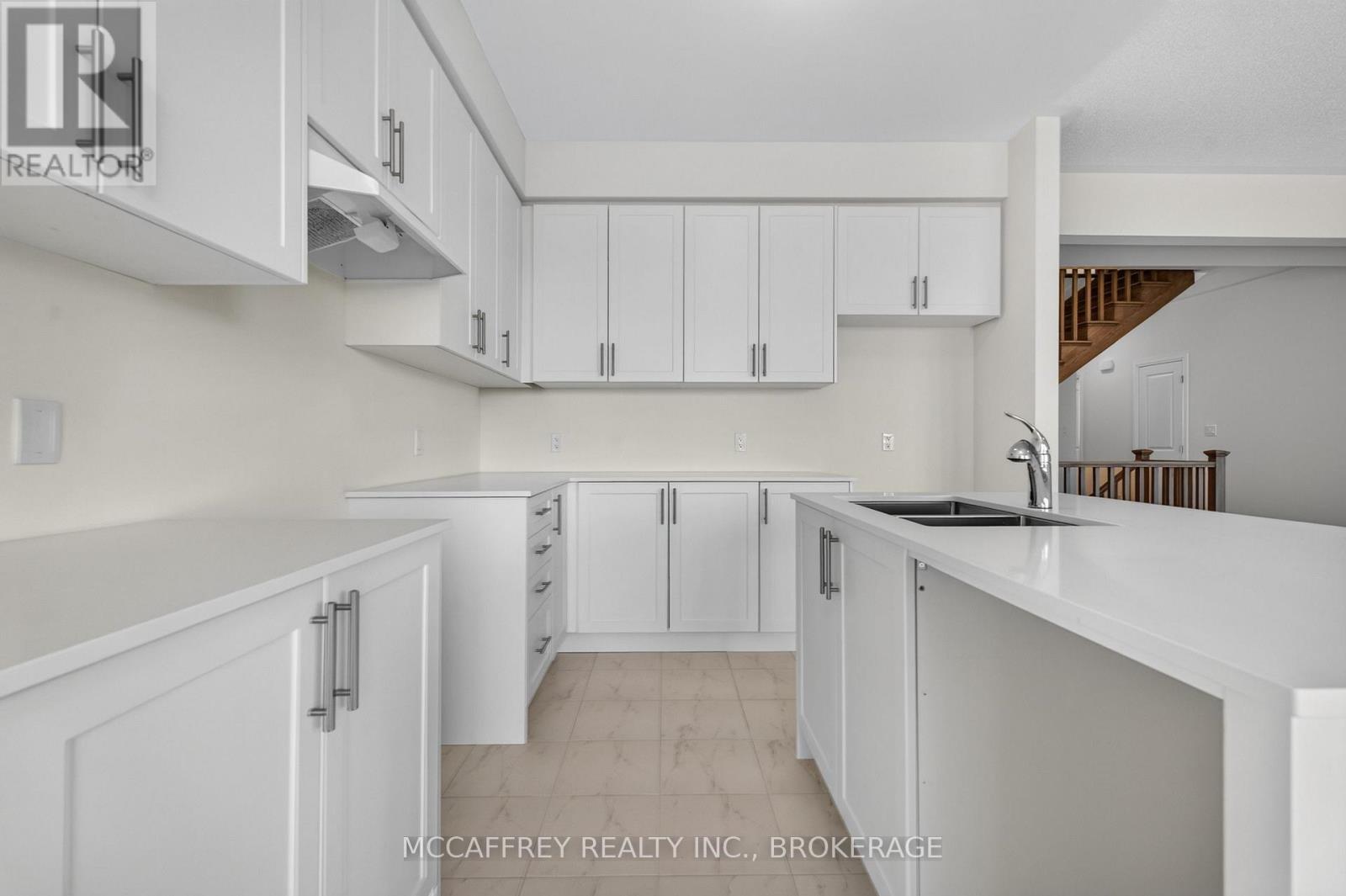 19 Oakmont Drive, Loyalist (Bath), ON - Indoor Photo Showing Kitchen With Double Sink