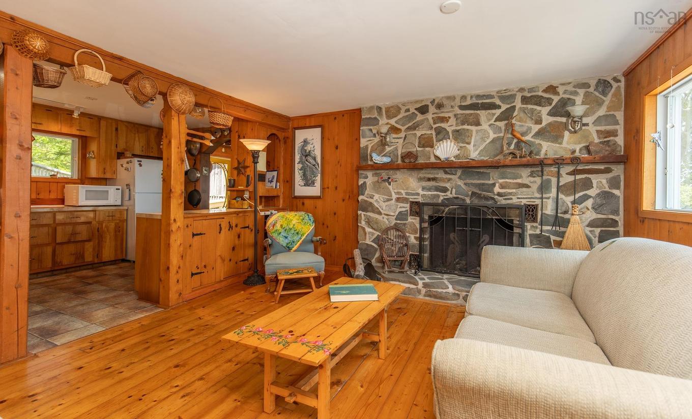 390-406 Highway 308, Morris Island, NS - Indoor Photo Showing Living Room With Fireplace