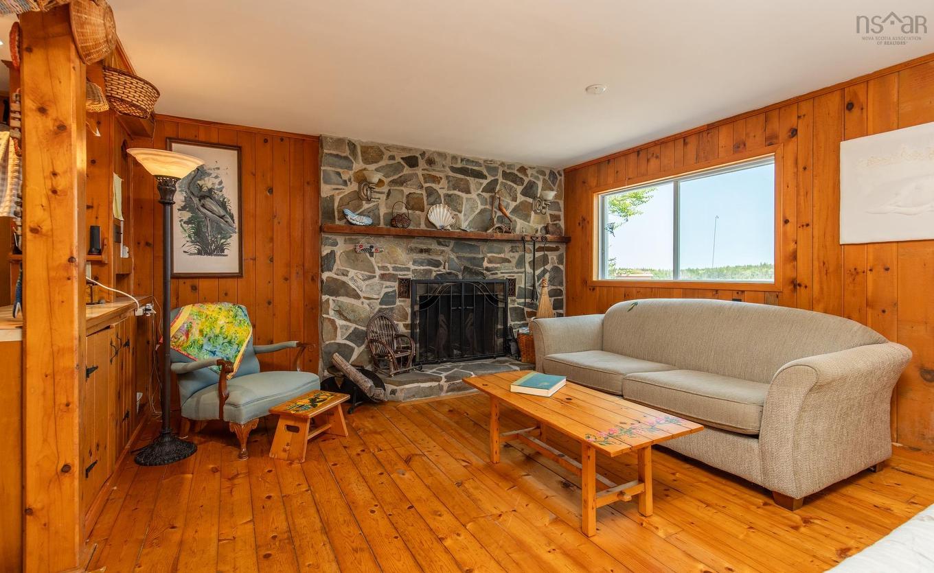 390-406 Highway 308, Morris Island, NS - Indoor Photo Showing Living Room With Fireplace