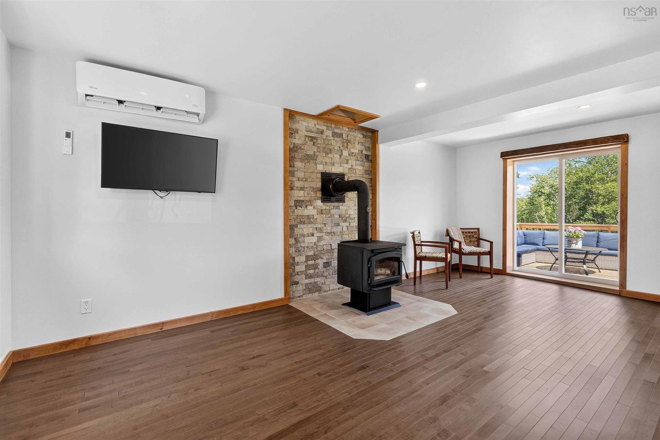 1959 Highway 208, Hemford, NS - Indoor Photo Showing Living Room With Fireplace