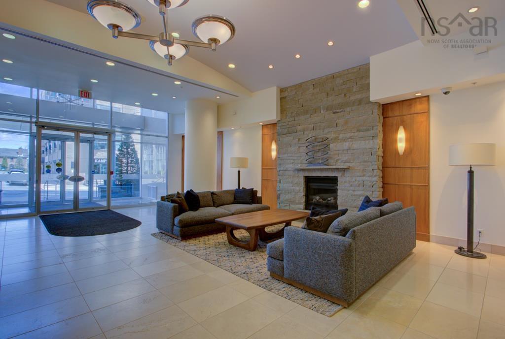 701 1550 Dresden Row, Halifax, NS - Indoor Photo Showing Living Room With Fireplace