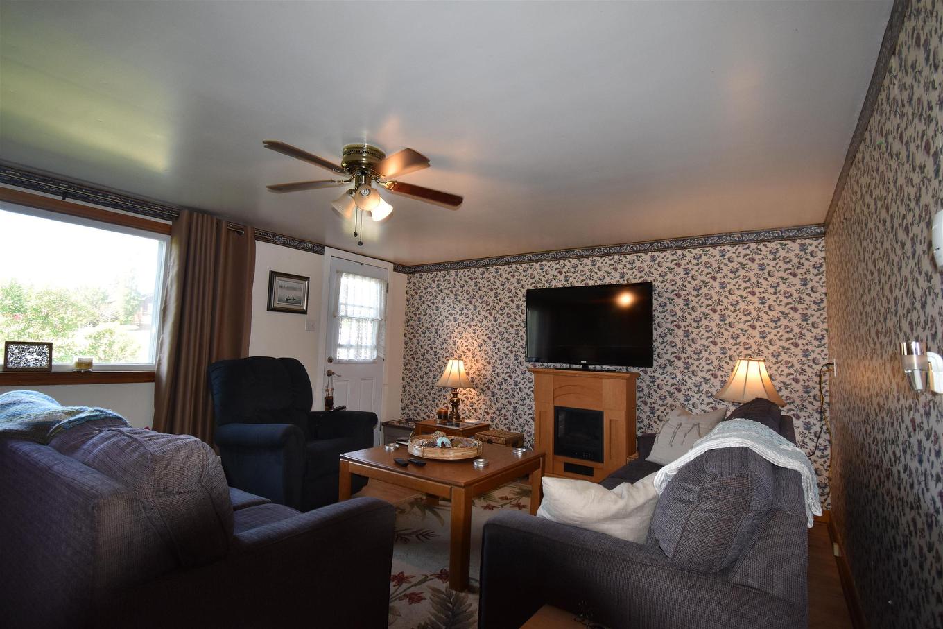 4540 Highway 2, Upper Economy, NS - Indoor Photo Showing Living Room With Fireplace