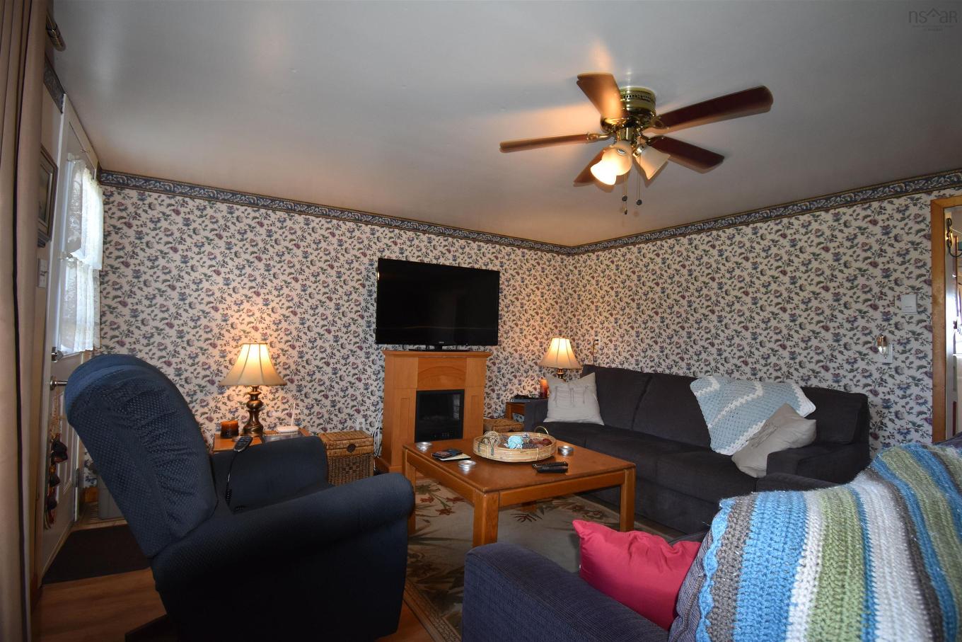 4540 Highway 2, Upper Economy, NS - Indoor Photo Showing Living Room With Fireplace