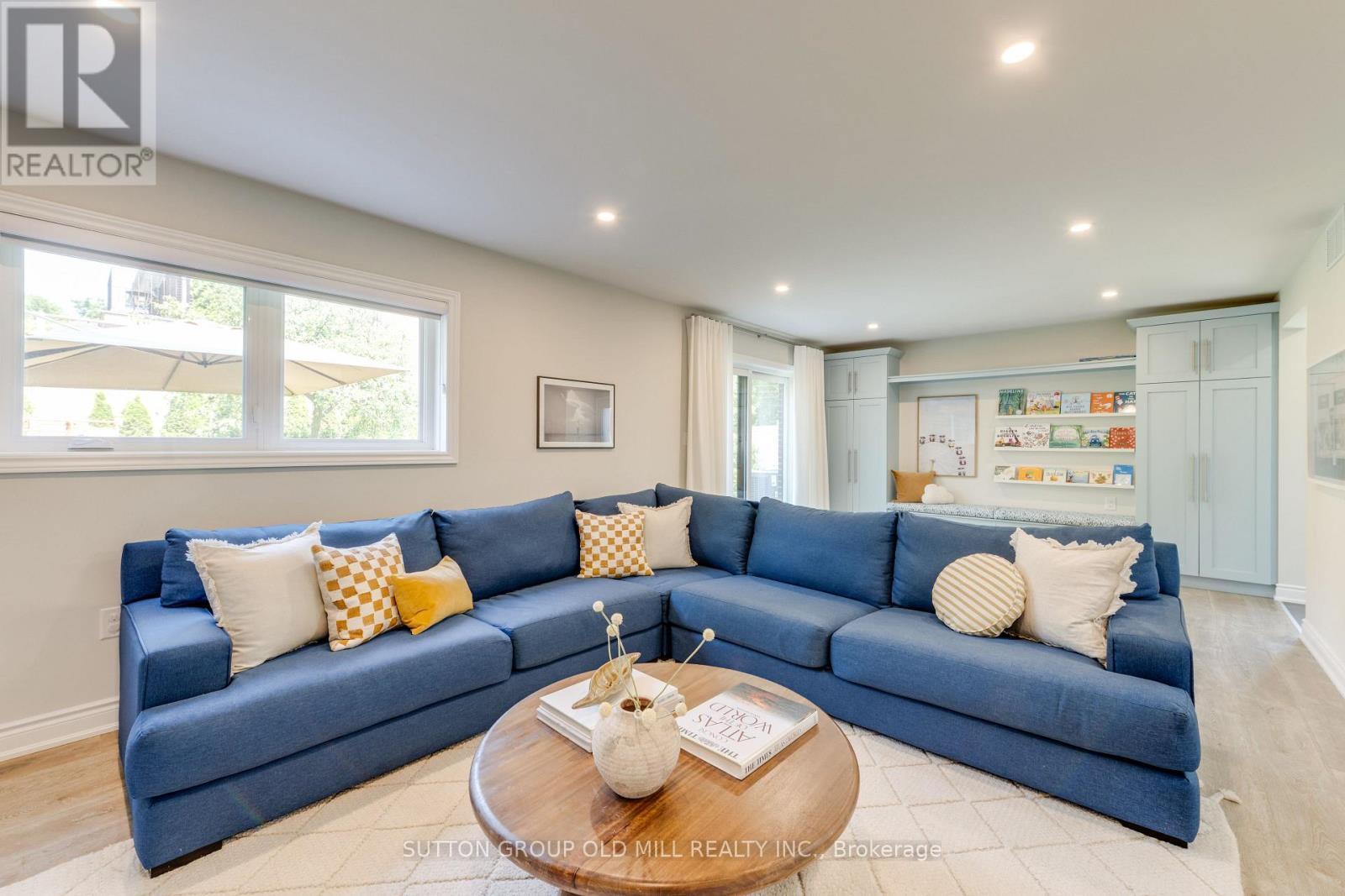 Ground floor family room w. walk-out to yard - 85 Bonnyview Drive, Toronto, ON - Indoor Photo Showing Living Room