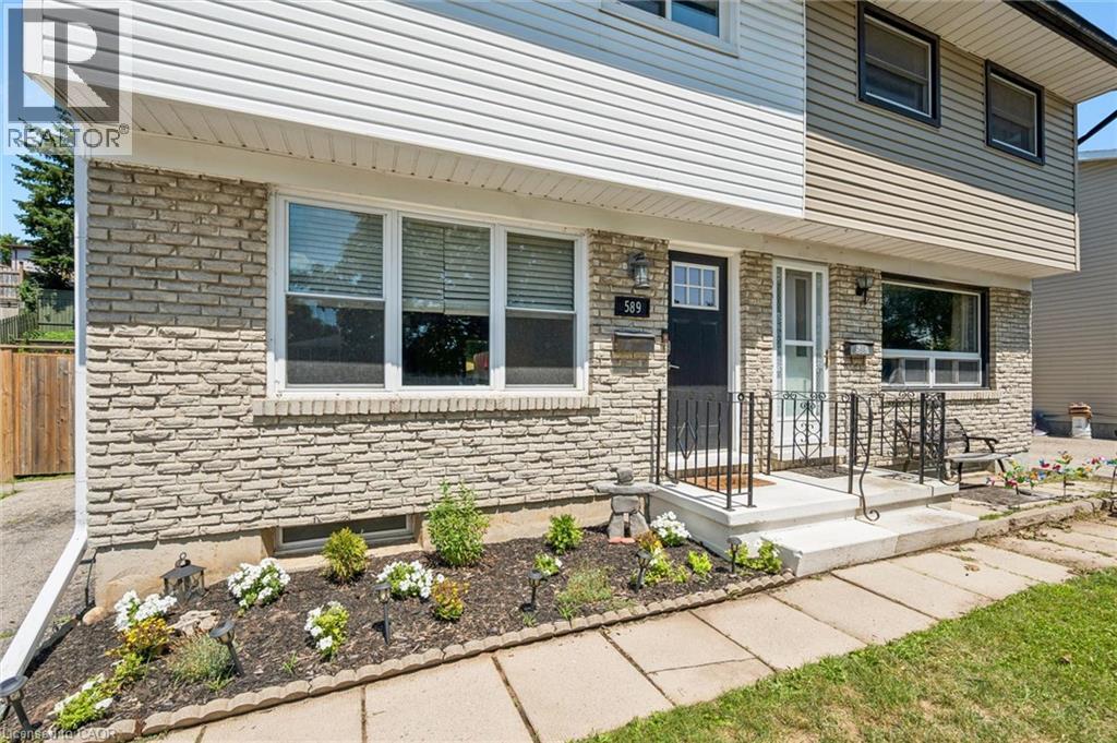Exterior showcasing a stone facade and horizontal siding - 589 Elgin Street N, Cambridge, ON - Outdoor
