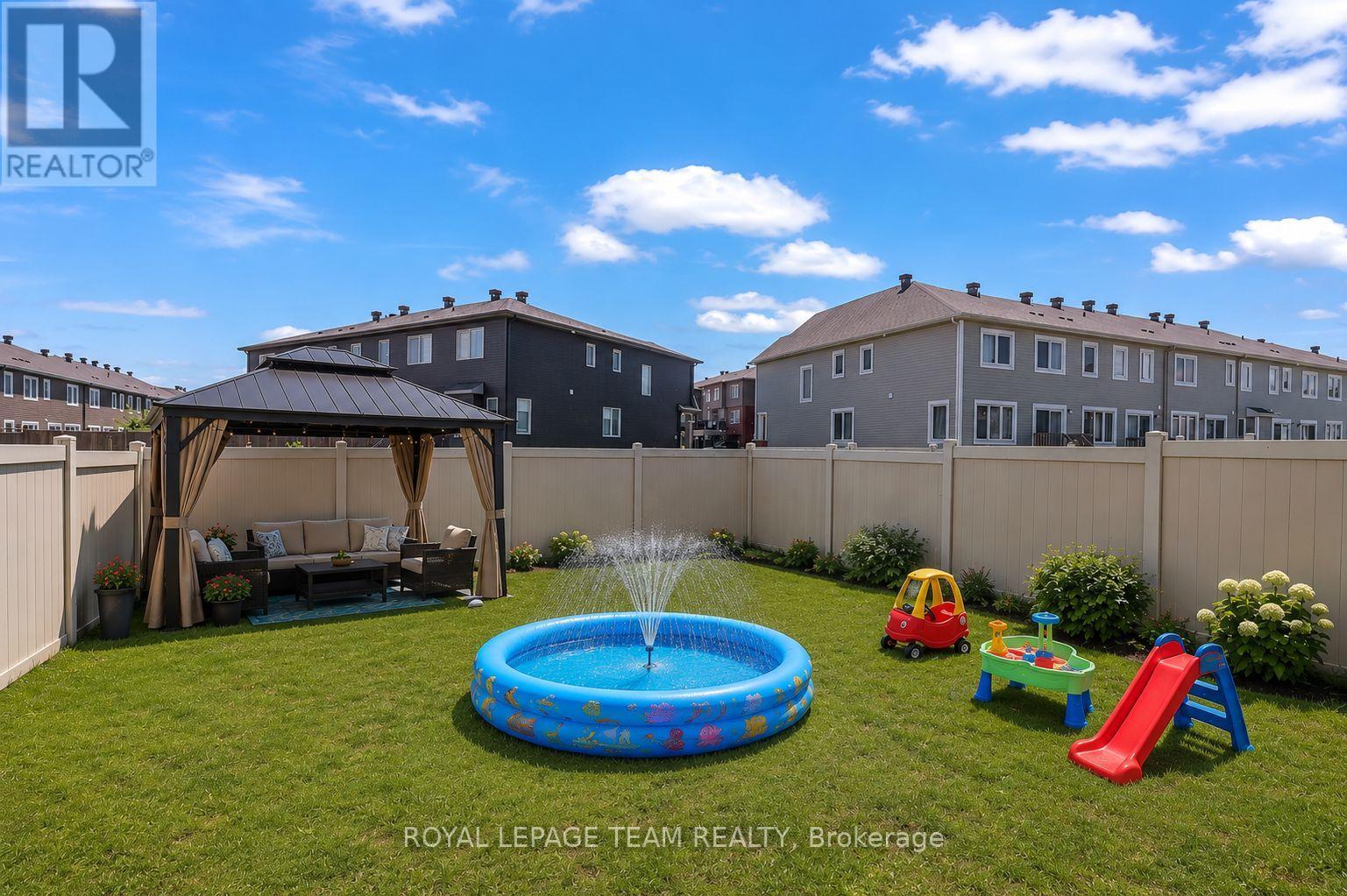 Photo has been virtually staged. - 4852 Abbott Street E, Ottawa, ON - Outdoor With Above Ground Pool With Backyard