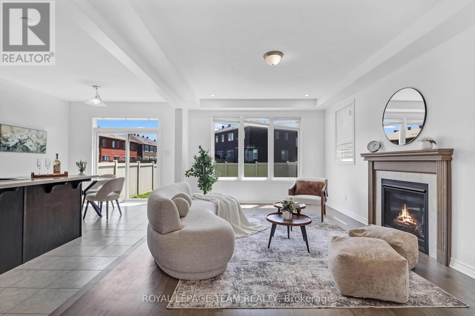 4852 Abbott Street E, Ottawa, ON - Indoor Photo Showing Living Room With Fireplace