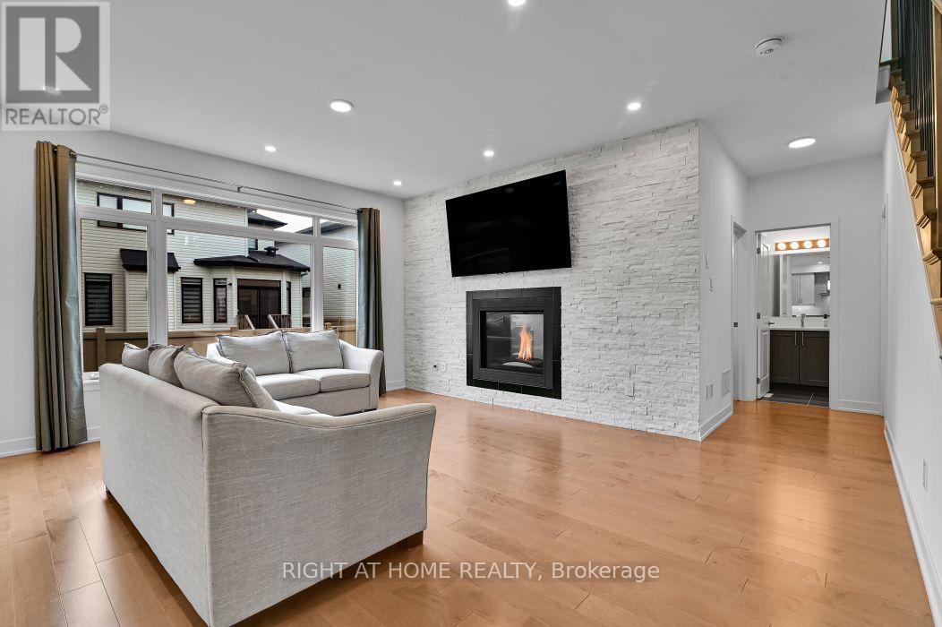 32 Edenbridge Court, Ottawa, ON - Indoor Photo Showing Living Room With Fireplace