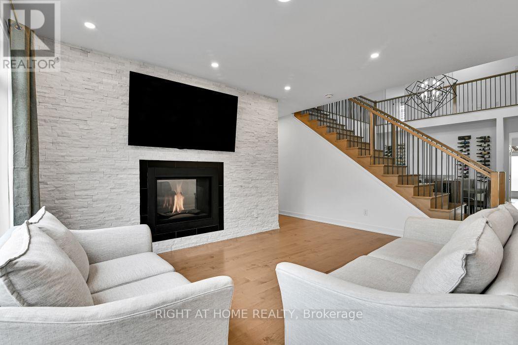 32 Edenbridge Court, Ottawa, ON - Indoor Photo Showing Living Room With Fireplace