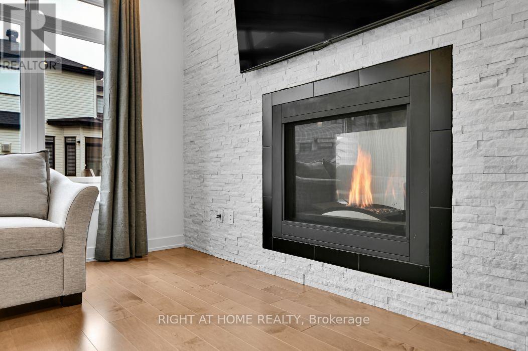 32 Edenbridge Court, Ottawa, ON - Indoor Photo Showing Other Room With Fireplace