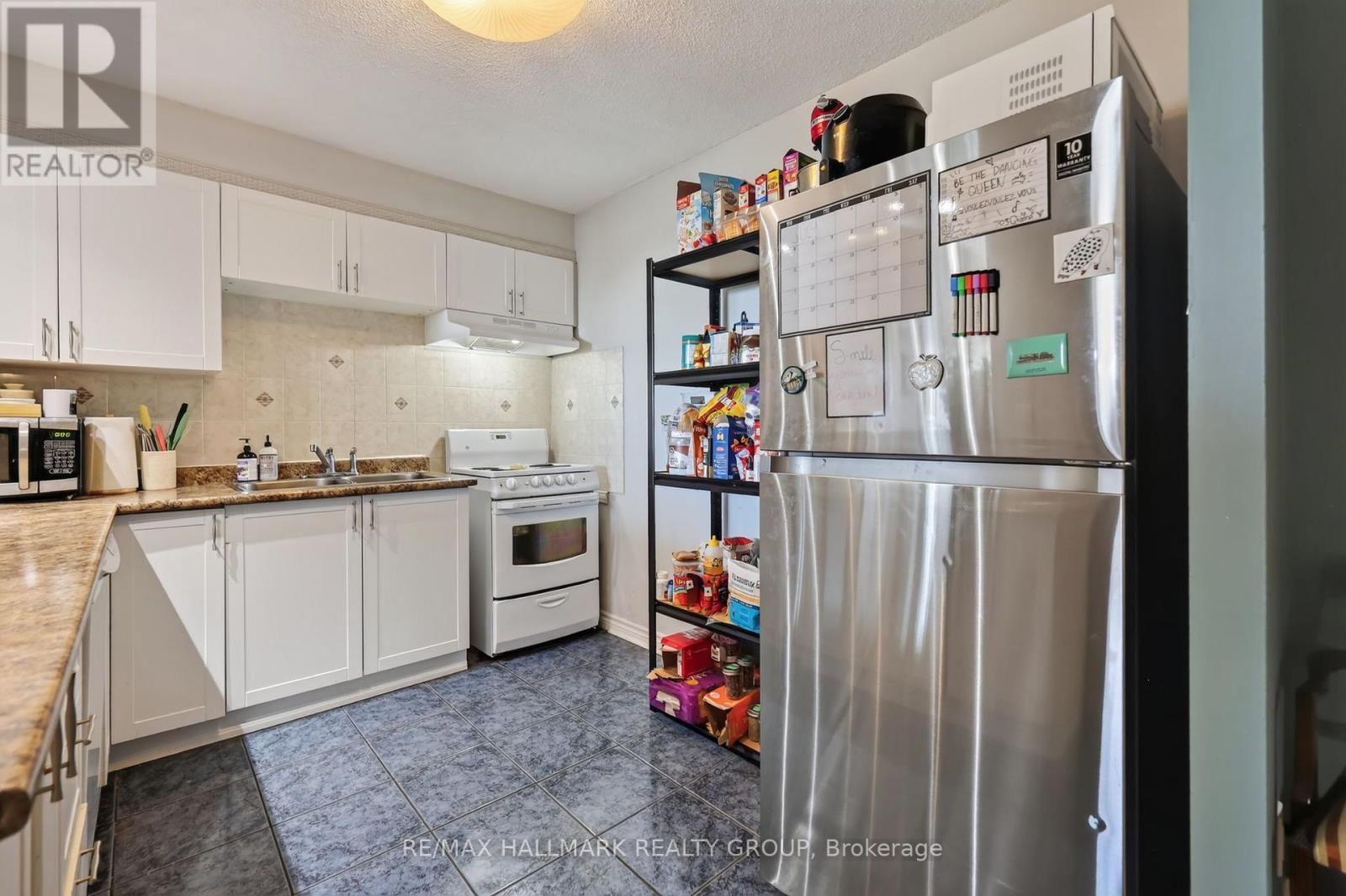 703 - 1380 Prince Of Wales Drive, Ottawa, ON - Indoor Photo Showing Kitchen With Double Sink