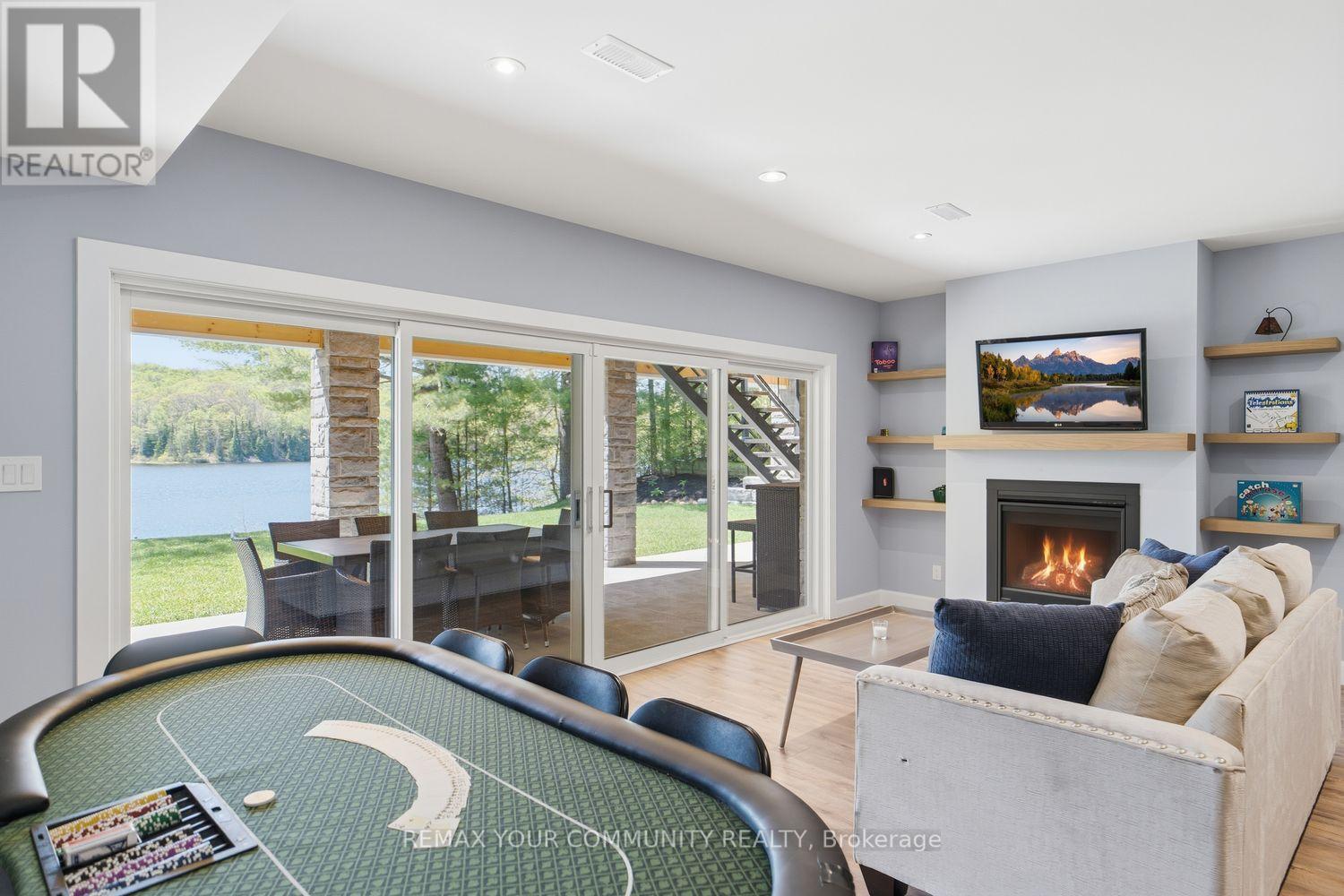 142 Bentley Lake Loop, Faraday, ON - Indoor With Fireplace