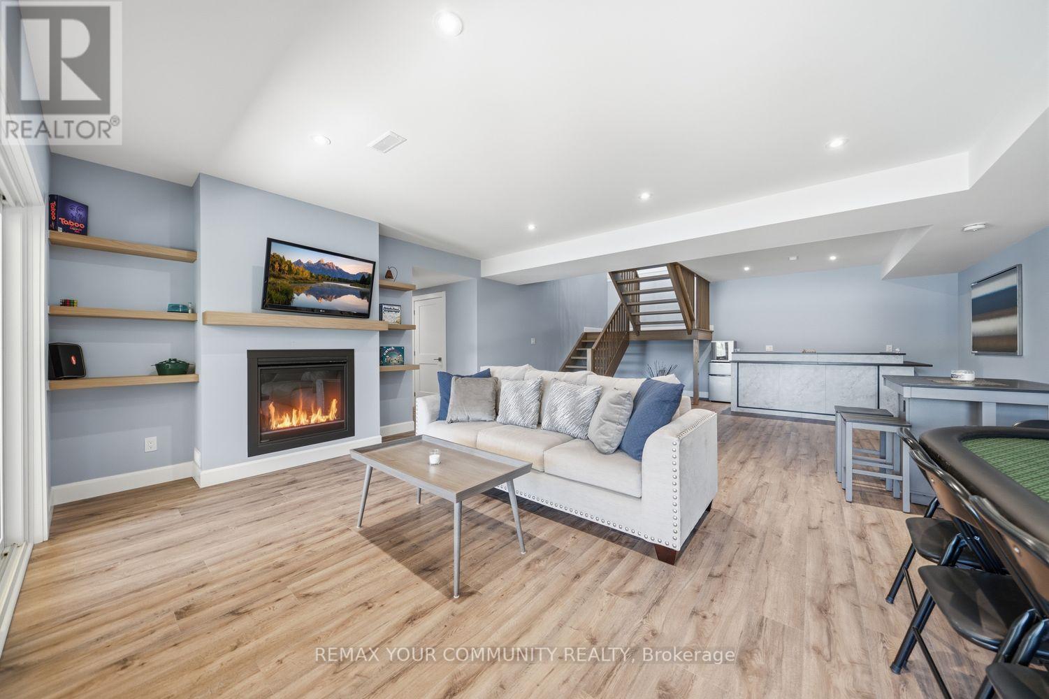 142 Bentley Lake Loop, Faraday, ON - Indoor Photo Showing Living Room With Fireplace