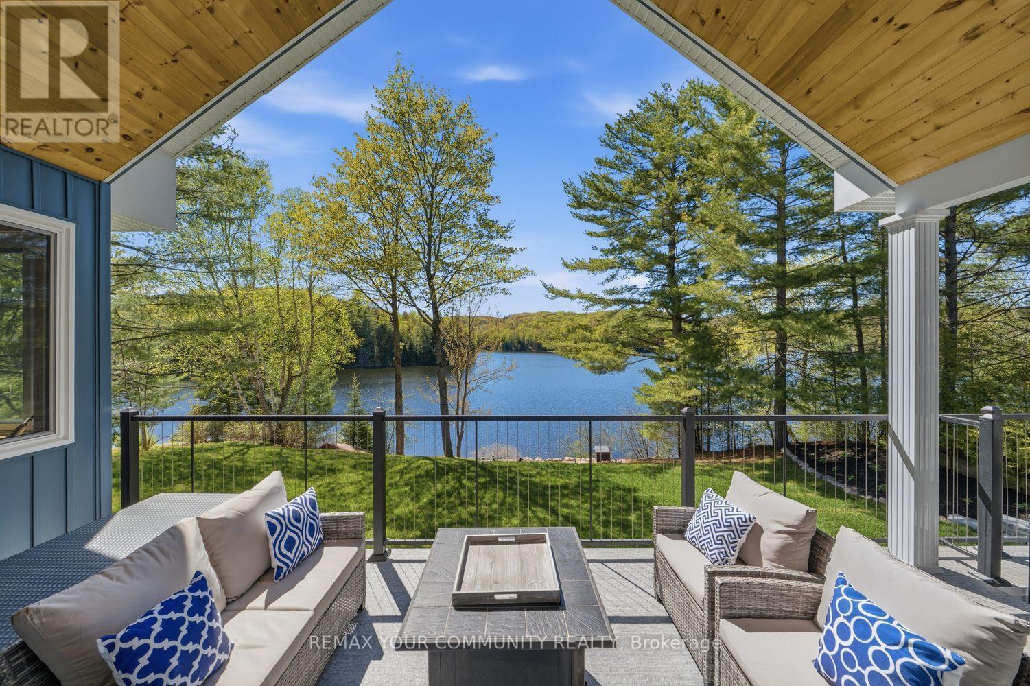 142 Bentley Lake Loop, Faraday, ON - Outdoor With Body Of Water With Deck Patio Veranda With View With Exterior