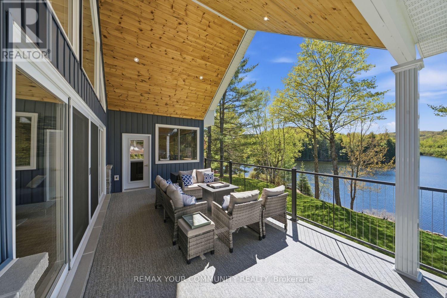 142 Bentley Lake Loop, Faraday, ON - Outdoor With Body Of Water With Deck Patio Veranda With Exterior